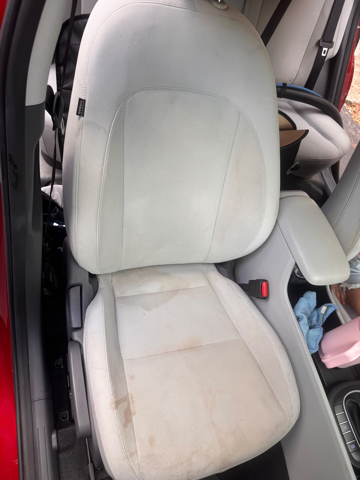 Car seat with stains before GraceWell cleaning